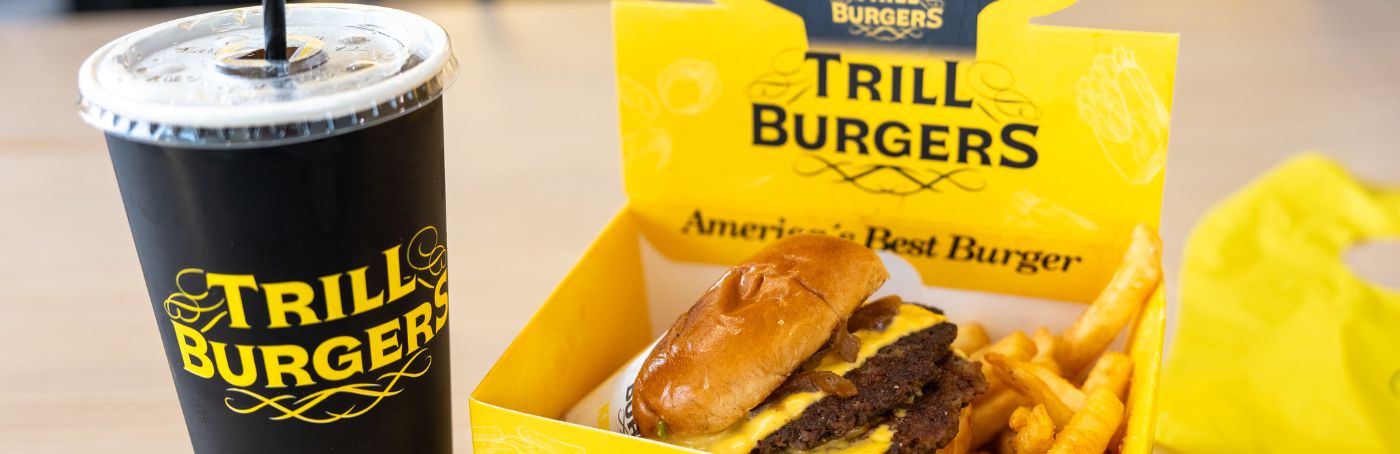 A Trill Burgers combo meal with a double cheeseburger, fries, and a drink